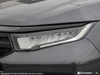 The 2026 Honda Odyssey Touring van in elegant Gray, complemented by a reliable automatic transmissio... (image 8)