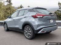 Navigating urban streets and weekend adventures is a breeze with this stylish Gray 2024 Nissan Kicks... (image 2)