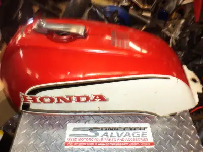sonic cycle has a 1983 honda cb - 1100 f gas tank oem stock paint has a few dings . mint cond. insid...