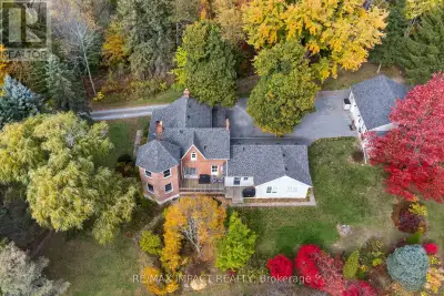 This meticulously cared-for and well-loved century home offers the perfect blend of historic charact...