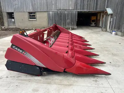 2011 Case IH 3408 Corn Header. Hydrualic deck plates. Knife rolls. Sensors. Available onsite. .