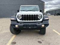 This Jeep Wrangler Sport 4x4 6 Speed Manual delivers a Regular Unleaded V-6 3.6 L/220 engine powerin... (image 7)