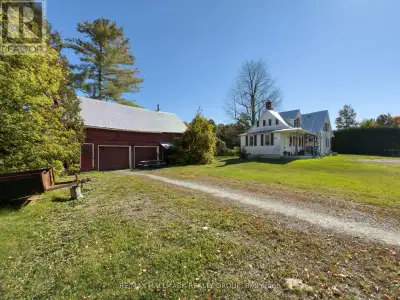 Country living awaits with this charming century-old farmhouse, full of character and warmth. Once p...