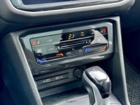 * R-Line exterior design with black styling elements, Black window surrounds, and Black exterior mir... (image 9)