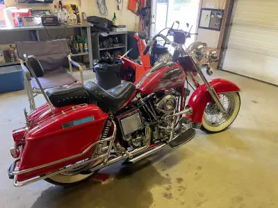 2 Seater, Custom rebuilt with white walls and spoked rims. Lots of chrome.