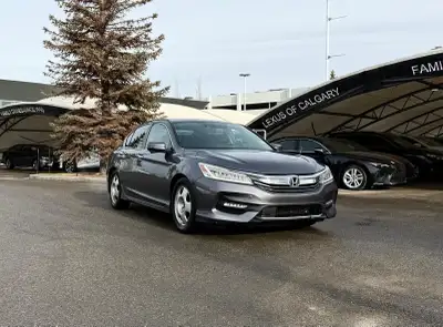 The 2016 Honda Accord Touring CVT Sedan represents the pinnacle of the 9th-generation's mid-cycle re...