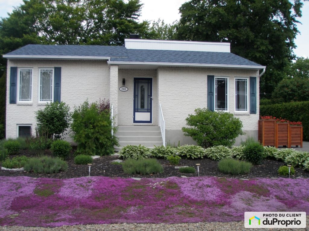 $534,900 - Bungalow for sale in Lavaltrie — photo 1