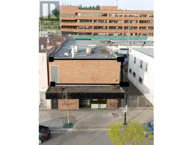 Incredible value in a prime high-traffic location! This spacious 2,805 sq ft office building is zone...