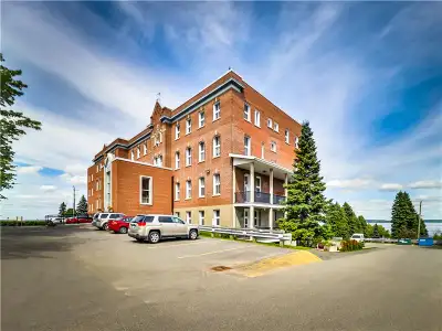 Suite Amenities Utilities Included: Heat Water White Refrigerator and StoveNo laundry About Located...
