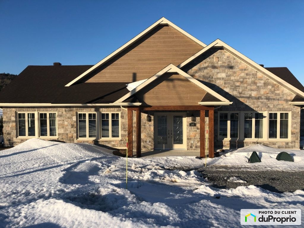 $759,000 - Bungalow for sale in Ste-Anne-Des-Monts — photo 1