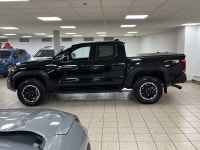 Engineered for drivers who want capability without compromising conscience, this 2025 Toyota Tacoma... (image 2)