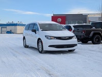 The 2026 Chrysler Grand Caravan SXT in Bright White with a Black interior offers the perfect blend o... (image 8)