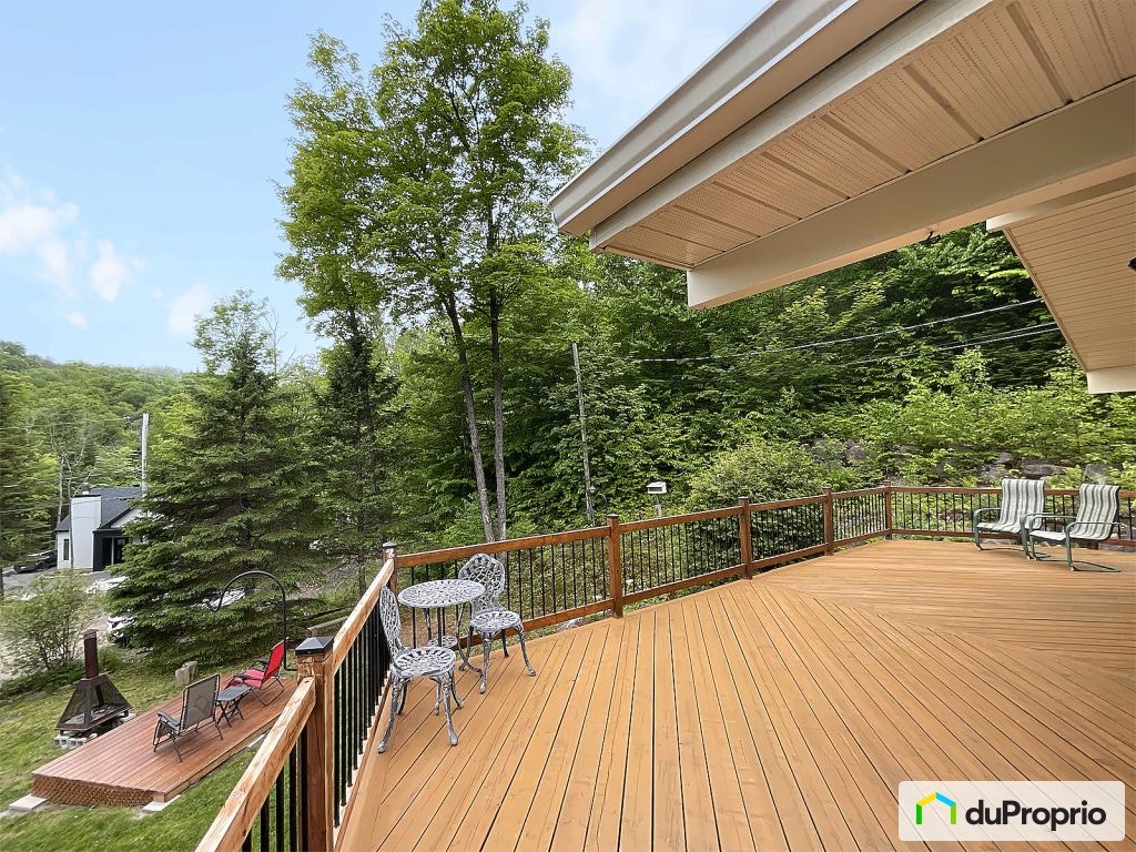$485,000 - Raised Bungalow in Ste-Marguerite-Du-Lac-Masson — photo 2