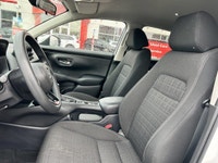 The pristine Platinum White Pearl exterior of this 2024 Honda HR-V LX-B instantly captivates. With j... (image 8)