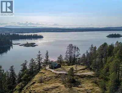 Discover the beauty and potential of island living on this private 19 acre lot on Quadra Island over...
