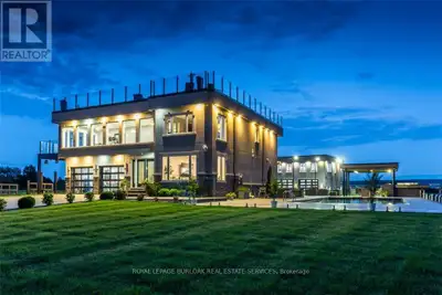 Experience resort-style living in this extraordinary estate overlooking Lake Ontario. Nestled among...