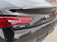 The 2017 Infiniti Q60 Premium is a luxurious 2-door coupe, often featuring a 300-horsepower 3.0L twi... (image 9)