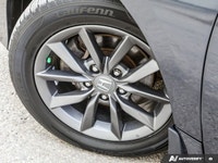 * 8-way power-adjustable driver's seat. * Heated front seats. * Dual-zone automatic climate control... (image 8)