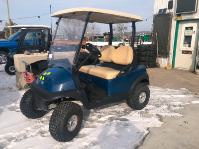 Used golf cart with off road wheels