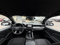 The SR5 focuses on utility and versatility, offering a standard three-row configuration and a part-t... (image 7)