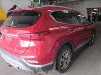 Finished in red with a black interior, this used 2019 Hyundai Santa Fe Preferred delivers the space,... (image 3)