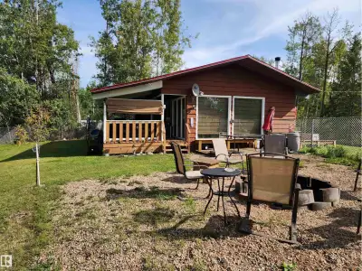 Charming 3 bedroom LAKEFRONT CABIN on Lower Mann Lake with vaulted ceilings and numerous updates, in...