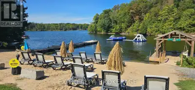 Exceptional 3.95-acre waterfront property on beautiful Dog Lake, part of the Rideau Canal System, re...
