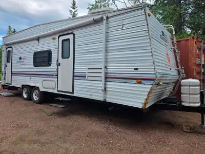 2002 All American Travel Trailer Toy Hauler This is a 27 foot trailer. Trailer includes fridge, stov...