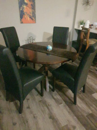 dining room  set ..wood round table with 4 chairs