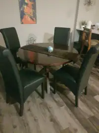 dining room  set ..wood round table with 4 chairs