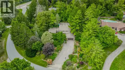 RARE FIND! Located on a stunning 1.11 acre property, this UNIQUE home offers a postcard setting of s...