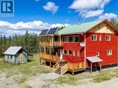 Escape to peaceful, self-sufficient living less than an hour from Whitehorse at 96750 Old Alaska Hig...