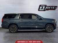 The 2025 GMC Yukon XL Elevation 4WD commands attention with bold styling, extended cargo versatility... (image 5)