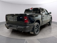 Introducing the 2026 Ram 1500 Sport 4x4 Crew Cab, beautifully styled in a Diamond Black Crystal Pear... (image 4)