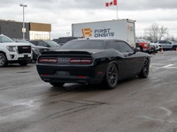 This 2016 Dodge Challenger R/T is powered by a classic 5.7L HEMI V8 engine paired with a smooth auto... (image 7)