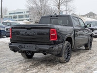 This Ram 1500 has a strong Twin Turbo Premium Unleaded I-6 3.0 L/183 engine powering this Automatic... (image 7)