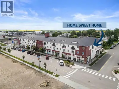 Welcome to this highly-sought-after top-floor corner unit condo in Crossfield, featuring ultra-low c...