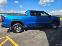 For a quick response please text 403-820-9940. AMVIC licensed business The 2023 GMC Sierra 1500 AT4... (image 6)