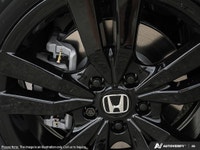 Experience the thrill of driving the new 2027 Honda HR-V in the Sport AWD trim. Cloaked in an elegan... (image 7)