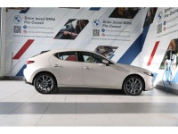 Low Mileage! Check out our large selection of pre-owned vehicles today. 2022 Mazda Mazda3 GT I4 AWD... (image 4)