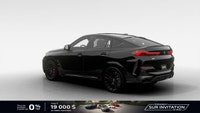 La conception audacieuse du *BMW X6 M60i 2026 *est indéniable. Du toit de type coupé au profil cisel... (image 1)