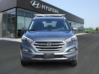 The 2018 Hyundai Tucson Premium FWD is a compact SUV that offers a perfect blend of modern design, a... (image 1)