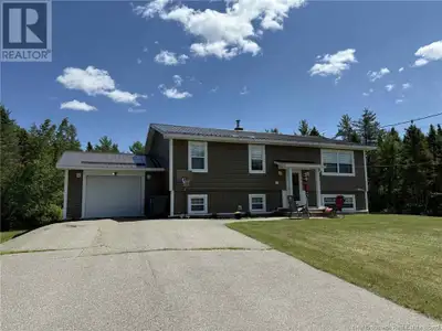 Country Living at Its Best! Welcome to this beautiful, move-in ready split-entry home with an attach...