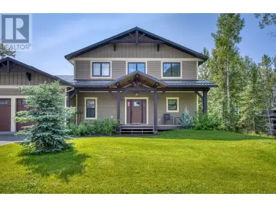 Experience mountain living at its finest in this exceptional 4-bedroom, 4-bathroom home perched on s...
