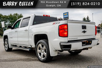 The 2018 Chevrolet Silverado 1500 LT in white offers the perfect balance of robust power and refined... (image 5)