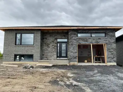 Now available in Cornwall's exclusive Campbell Subdivision in the north end, new bungalow with attac...