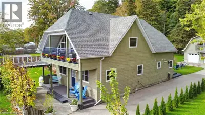 Beautiful turnkey home with second dwelling apartment above the garage and all with full lake views...