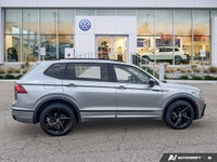 The 2024 Volkswagen Tiguan Comfortline R-Line Black Edition elevates every journey with its distinct... (image 5)