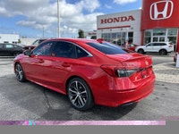Experience the thrill of driving the 2023 Honda Civic Sedan Touring, a certified pre-owned beauty wi... (image 6)