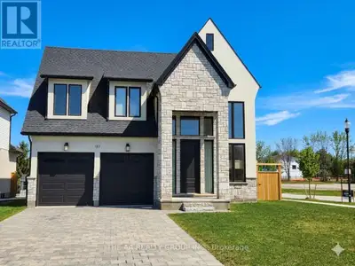 Experience modern living in the heart of Thorndale's Foxborough community at 187 Foxborough Place. T...